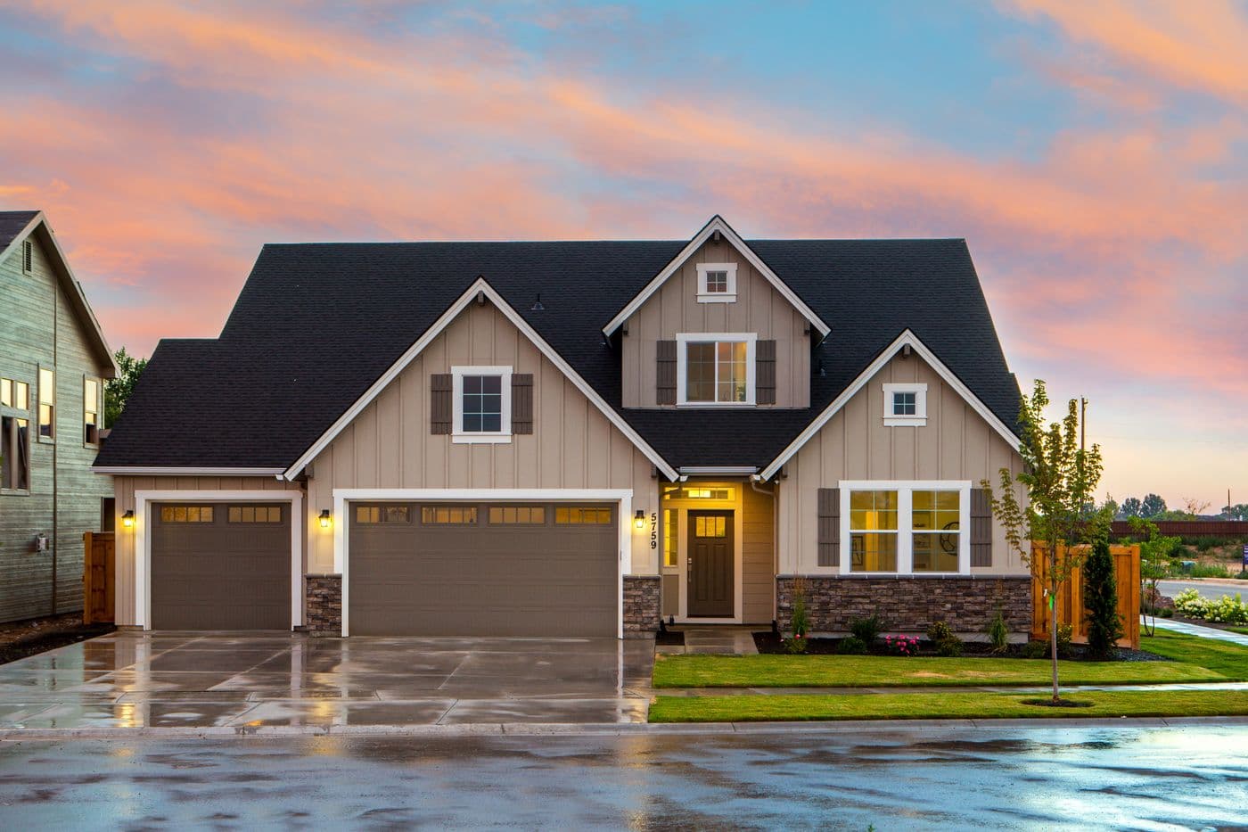 A newly built two-story home at sunset